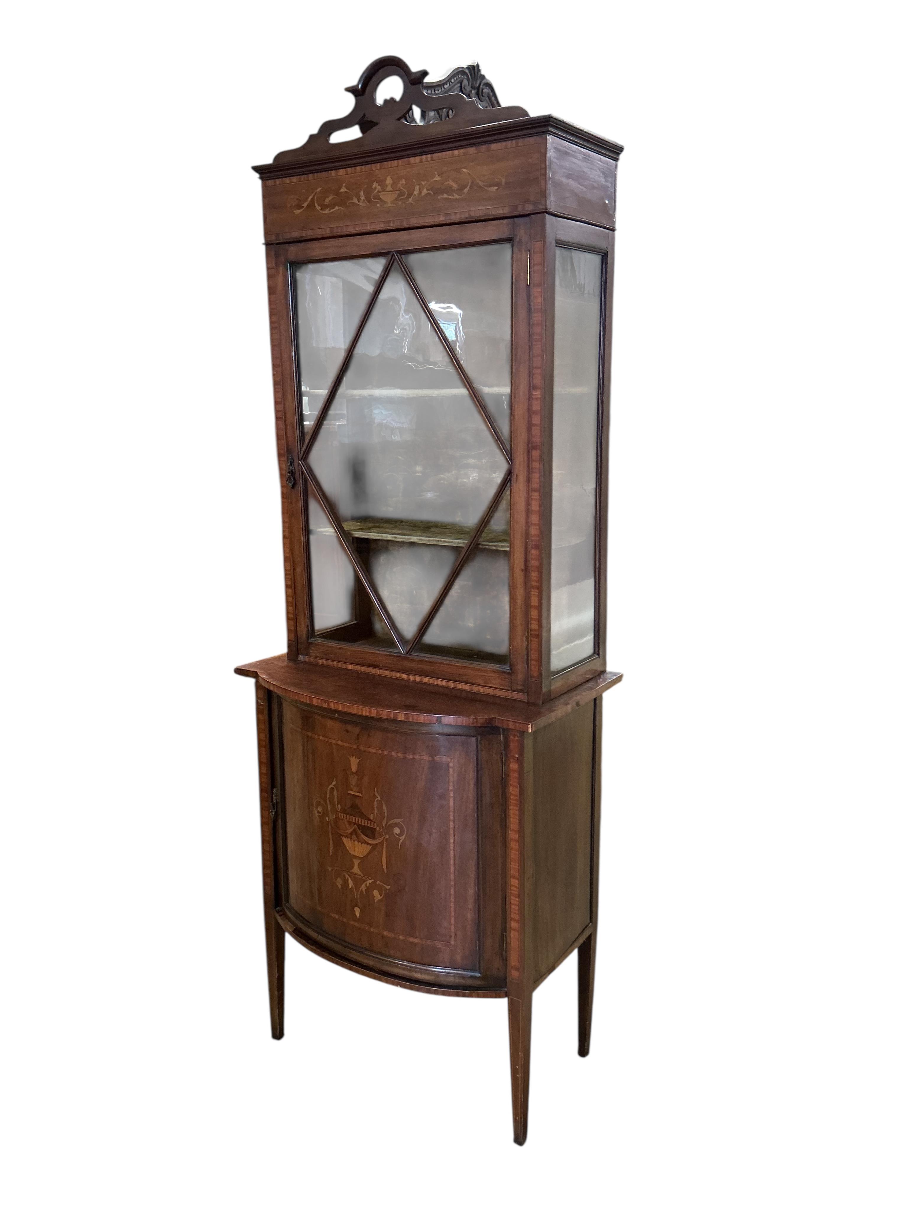 An Edwardian inlaid mahogany bowfront display cabinet, width 67cm, depth 42cm, height 188cm
